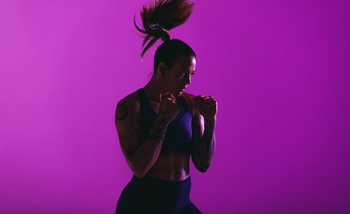 Monochrome portrait of fit woman doing workout