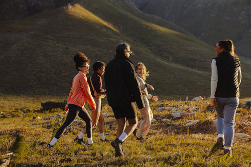 Group hiking in peaceful mountain setting