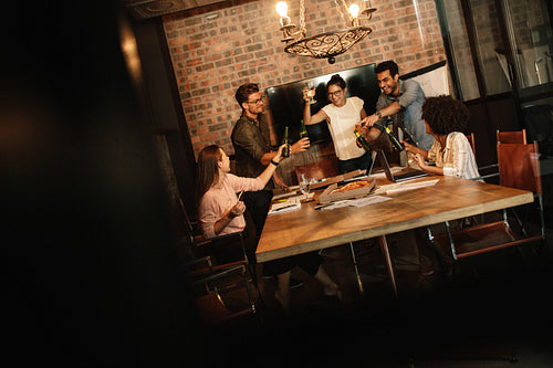 Team celebrating successful business deal