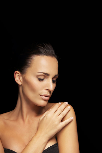 Young beauty with glowing complexion