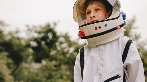 Boy playing to be an astronaut