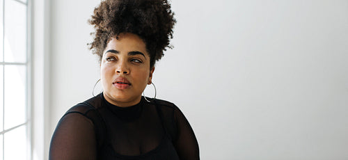 Fashionable lady looking away