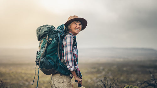 Portrait of an excited female trekker
