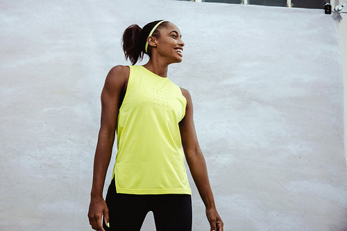 Smiling fitness woman on white background