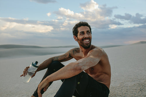 Man in desert after physical training session