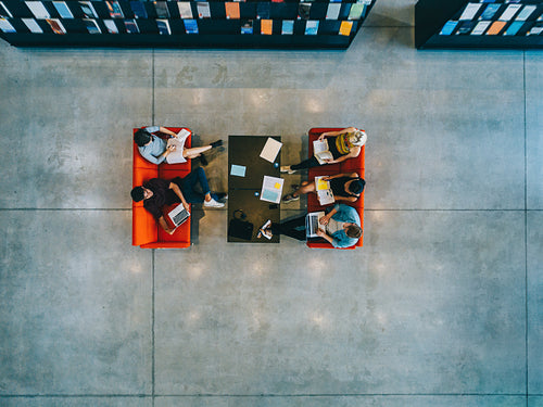 University students sitting in a library