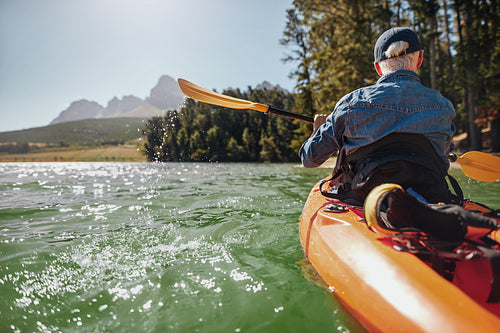 Man canoeing in a lake