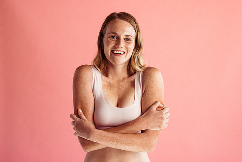 Portrait of woman with freckles on body