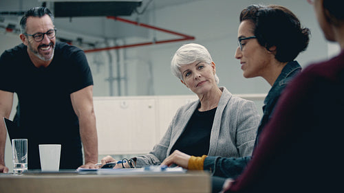 Business people reviewing a document in a meeting