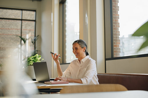 Woman working in coworking office space