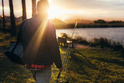 Man going for fishing near a lake