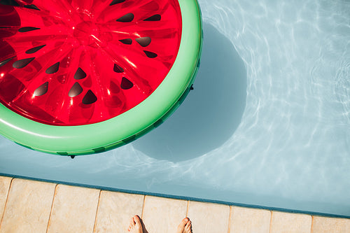 Inflatable watermelon floating mattress in pool