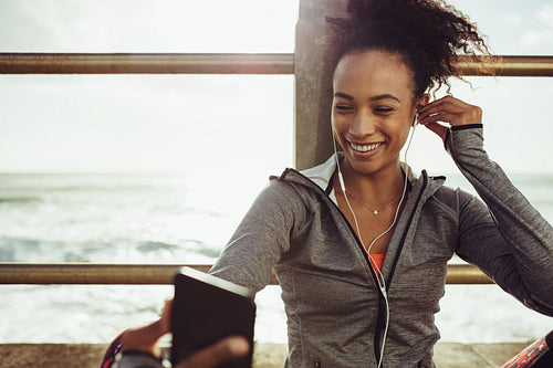 Runner enjoying listening to music