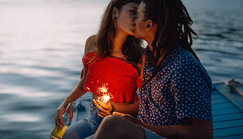 Young couple kissing passionately during a vacation