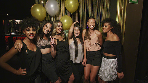 Beautiful female friends having great fun at the party