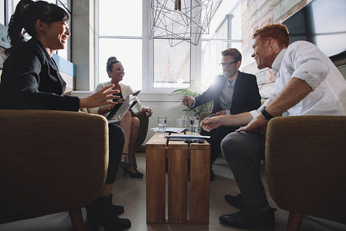 Business professionals meeting in modern office
