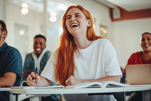 Student laughing during the lecture in class