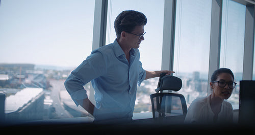 Business colleagues working in office