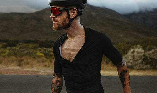 Male cyclist in protective gear