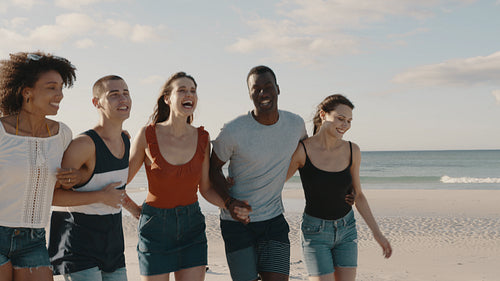 Group of young people enjoying holidays at the beach