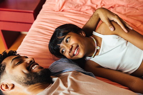Smiling father and daughter bonding together in a cozy setting