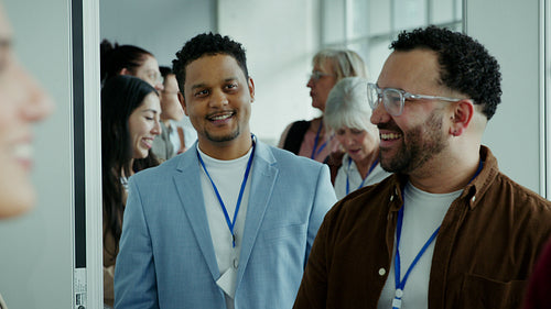 Engaged attendees laughing at an event