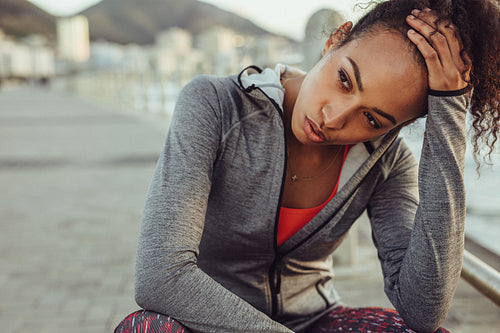 Runner resting after intense training