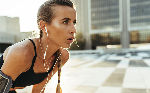 Close up of a fitness woman relaxing during workout