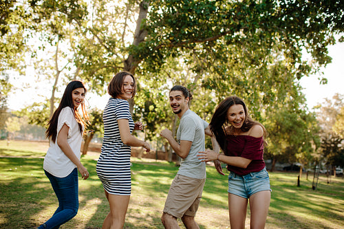 Friends enjoying a summer in the park