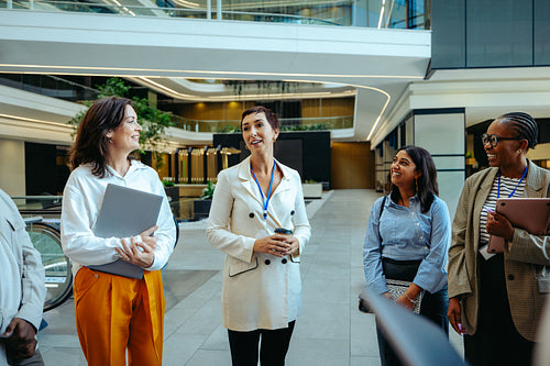 Diverse female team engaging in a vibrant discussion