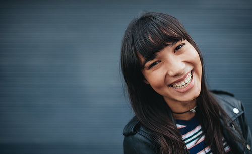 Close up of beautiful smiling young woman
