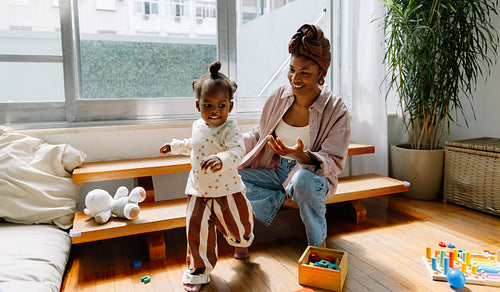 Mother and child playing at home