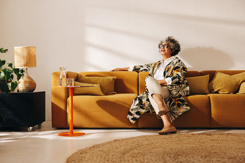 Mature businesswoman smiling happily in an office lobby