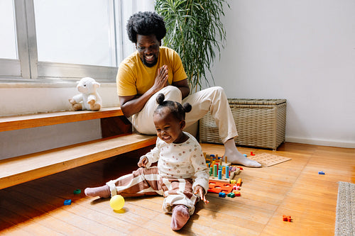 Father and daughter enjoying playtime