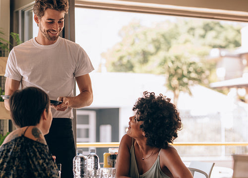Female friends at restaurant