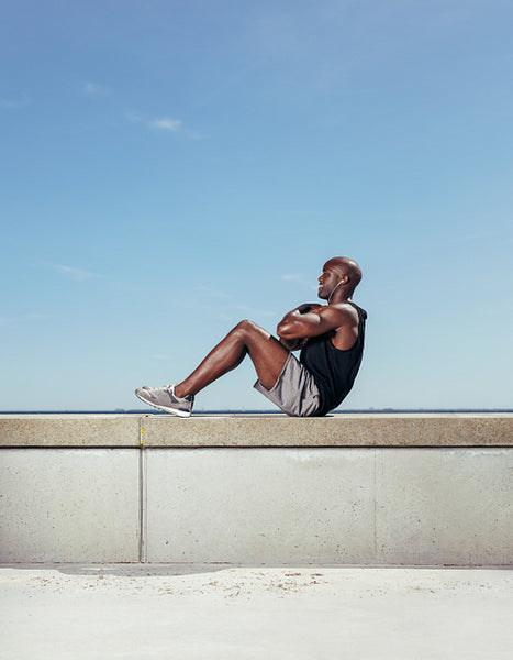 Fit young man exercising outdoors