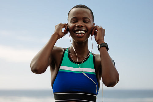 Runner listening music to get relax after workout