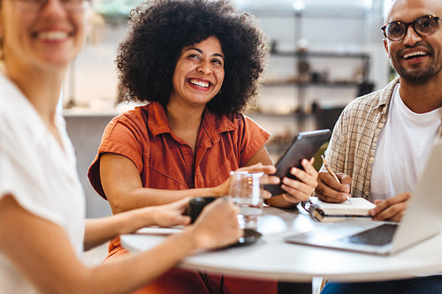 Remote business team having an informal meeting in a cafe