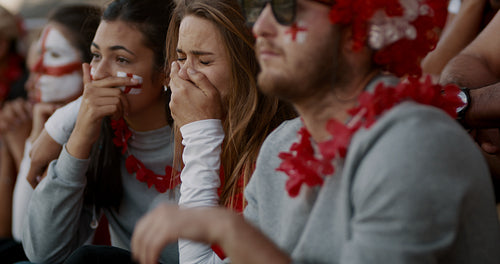 Upset English football fans crying after defeat