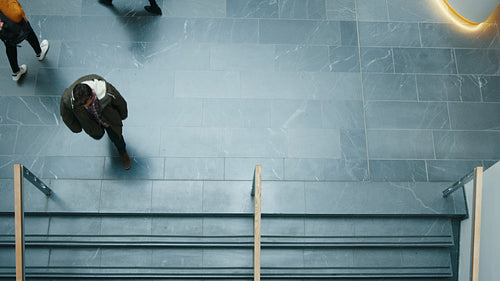 Lively lobby: View of people in motion in a professional setting