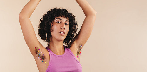 Young woman embracing her body hair