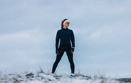 Fitness and confidence define the woman in this winter outdoor portrait