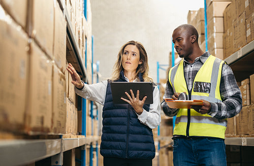 Warehouse colleagues doing stock control