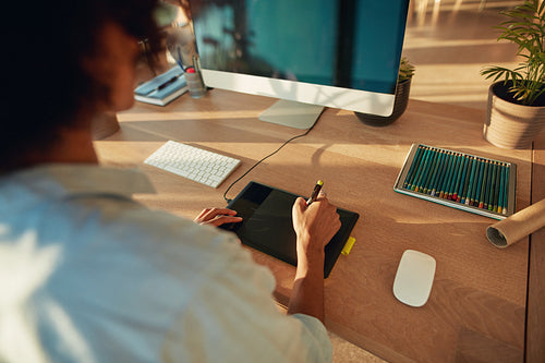 Woman working at creative workplace
