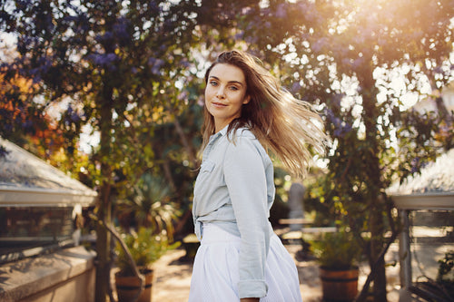 Woman fashion model at a garden