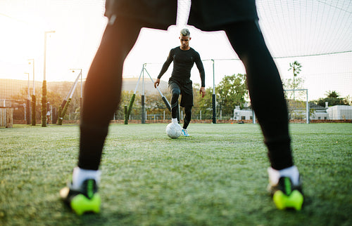 Football team practicing on soccer pitch