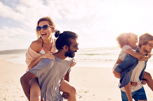 Young people having fun on the beach