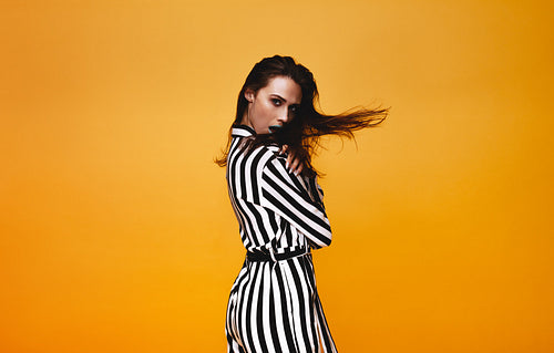 Glamorous female model in studio