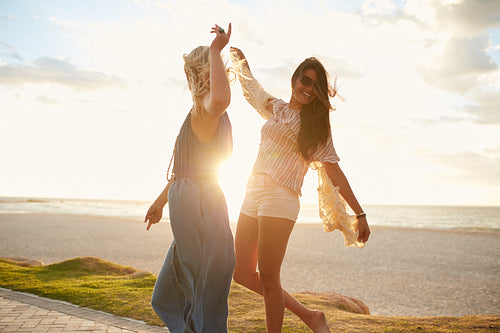 Best friends having fun on the beach
