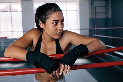 Female boxer inside a boxing ring
